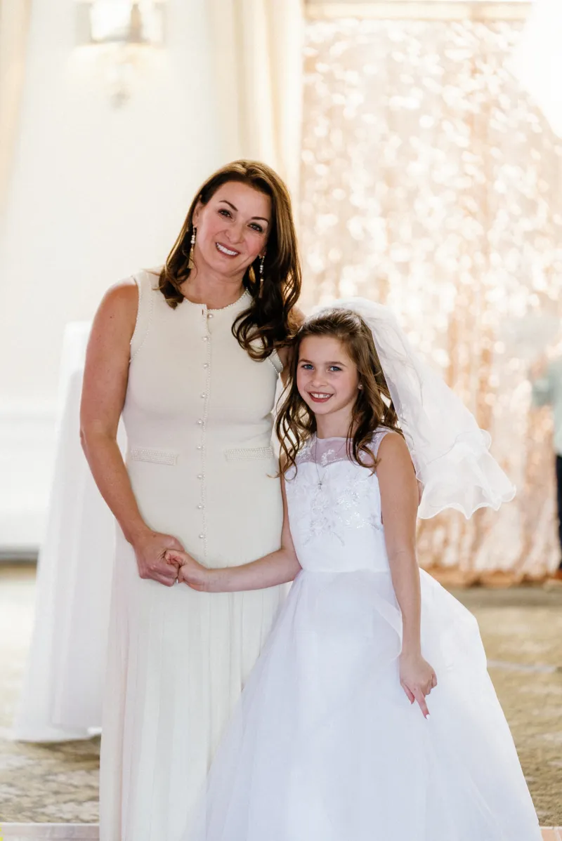 Mother with daugher at her first communion