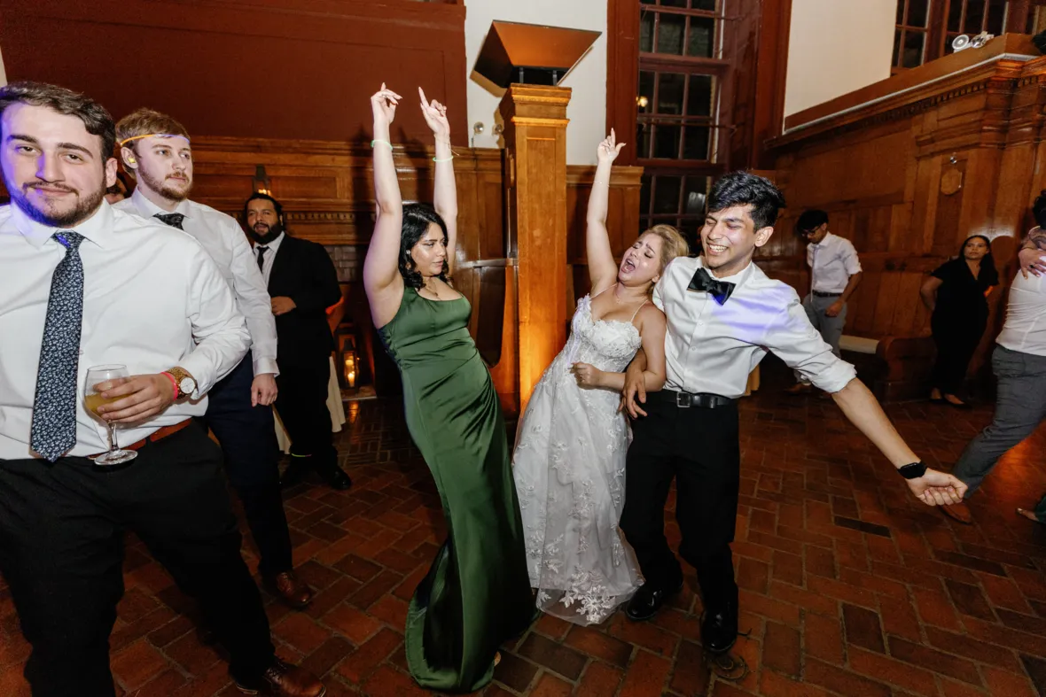 Bride dancing with friends