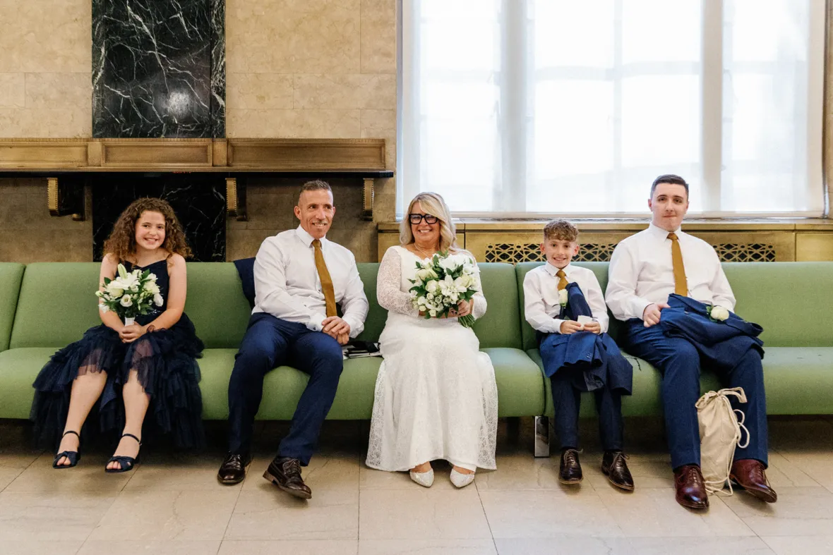 Family waiting in City Hall for wedding ceremony