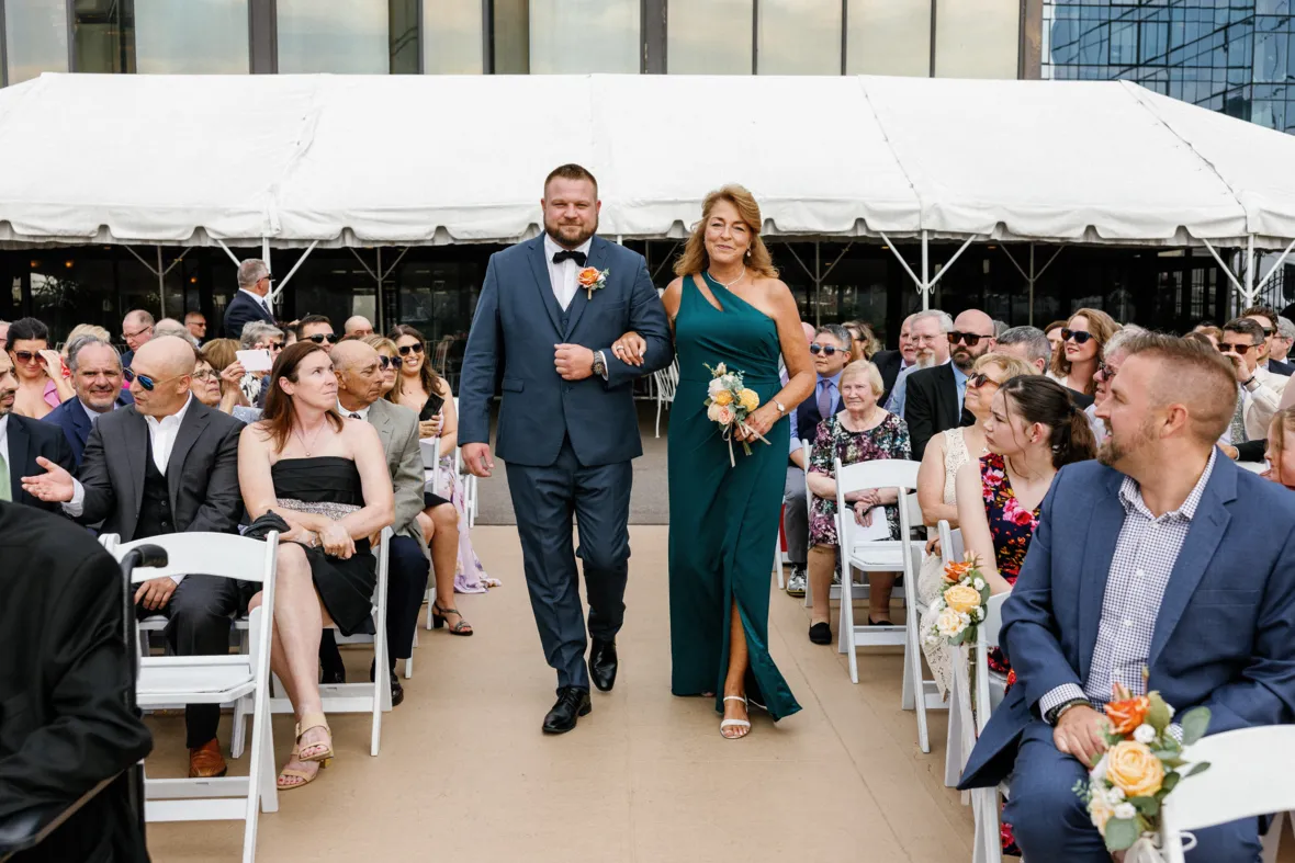 Groom walking down the aisle