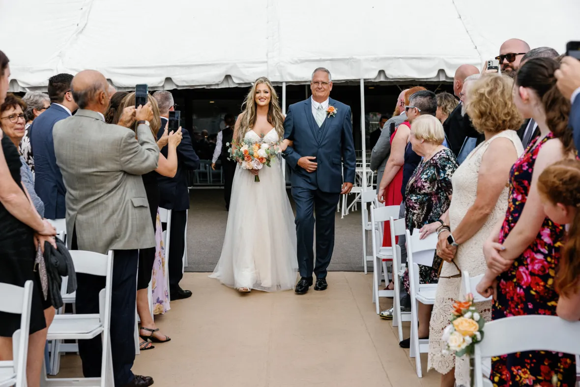 Bride walking down the aisle with father