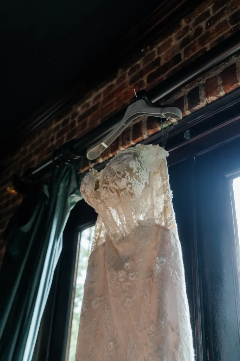 Wedding dress hanging on the window