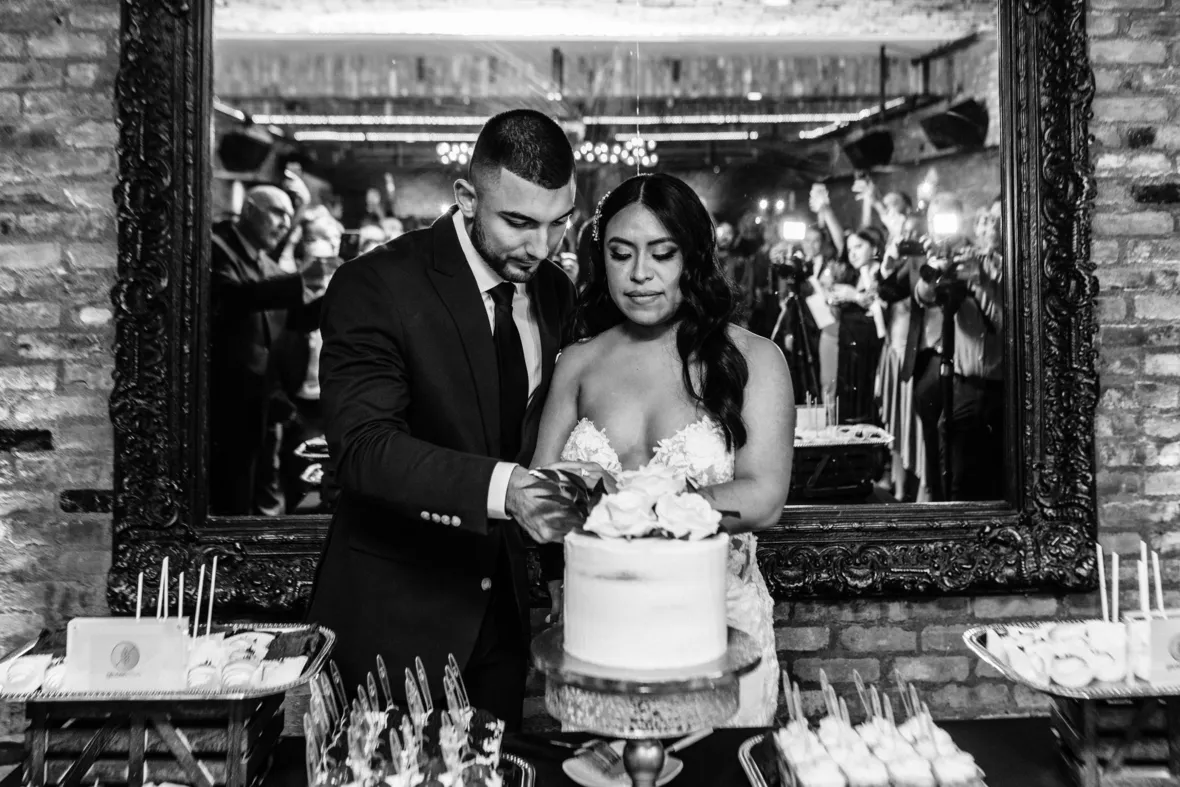 Bride and groom cutting the cake