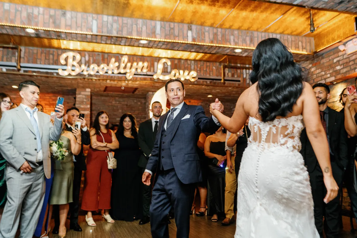 Bride dancing with her father at wedding reception