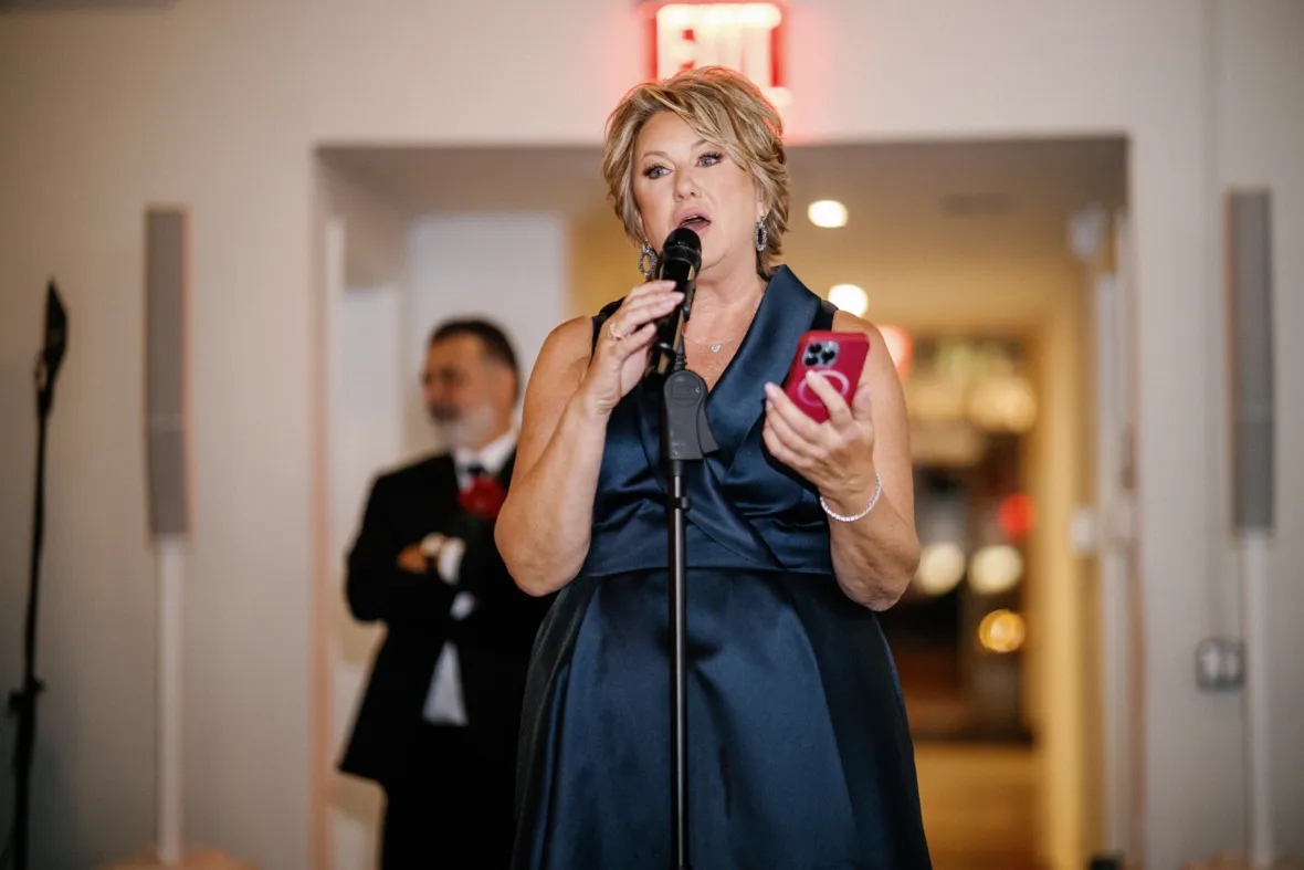 A woman giving a wedding toast